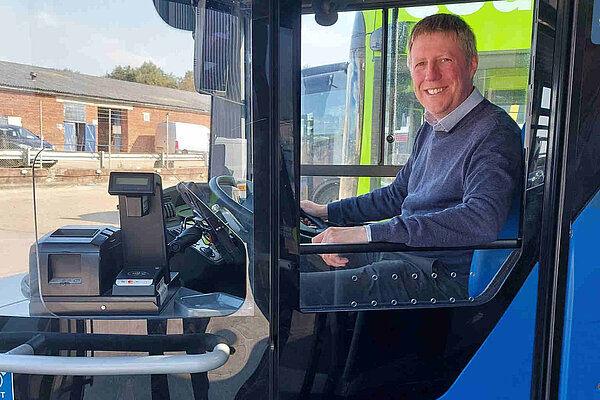 James MacCleary looking very pleased to be in the driving seat of a Brighton and Hove Coaster bus